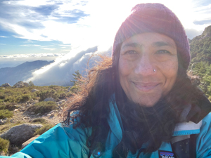 Lakshmi hiking in the clouds